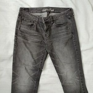 Grey skinny kick jeans